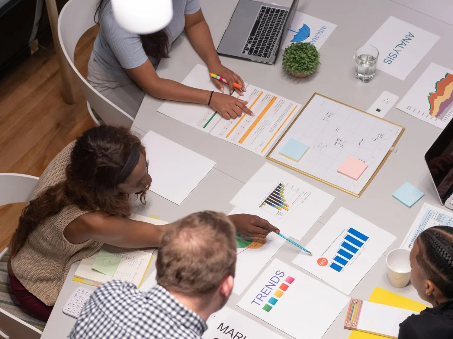 Business team reviewing charts during a planning session