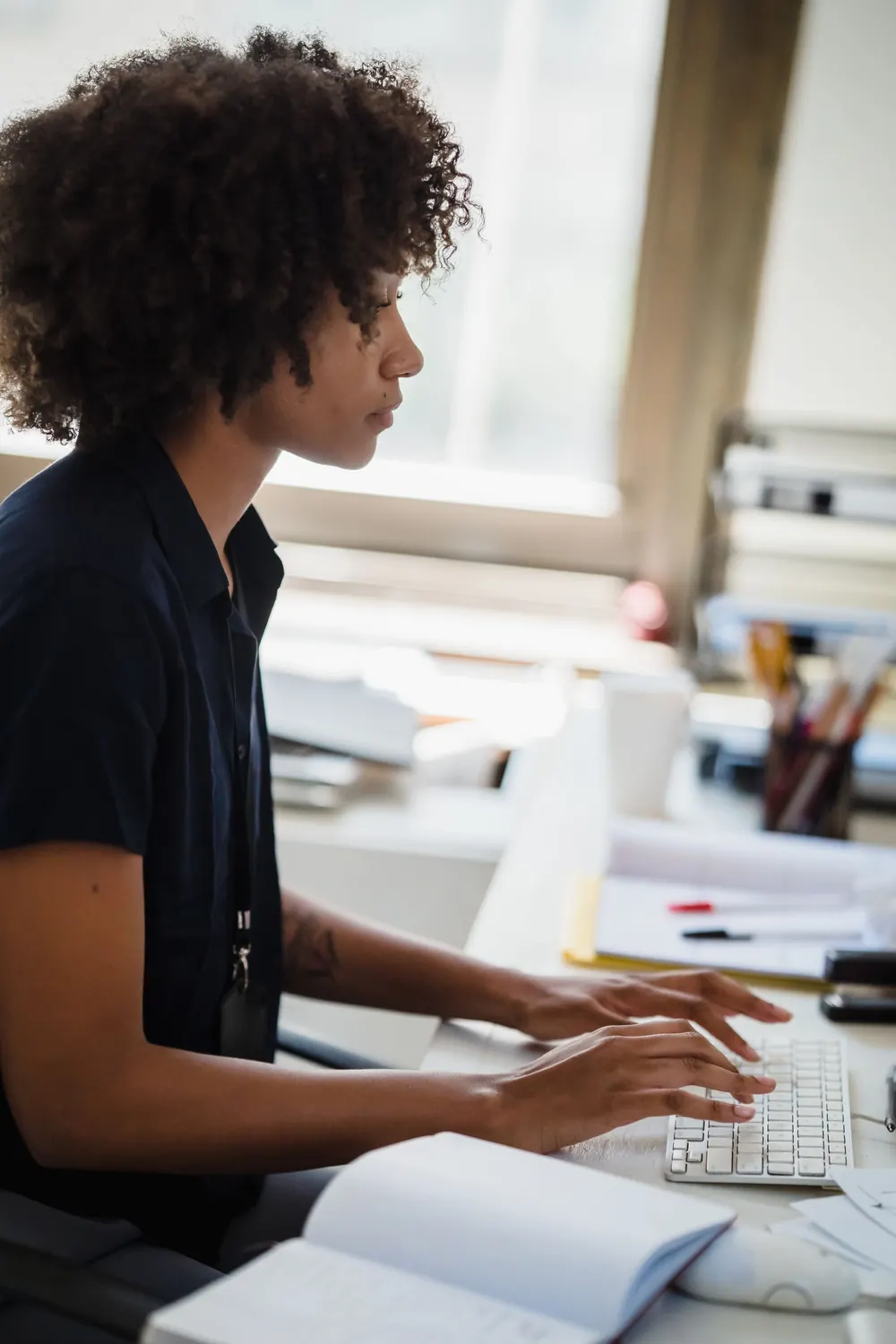 Business professional reviewing information at a computer