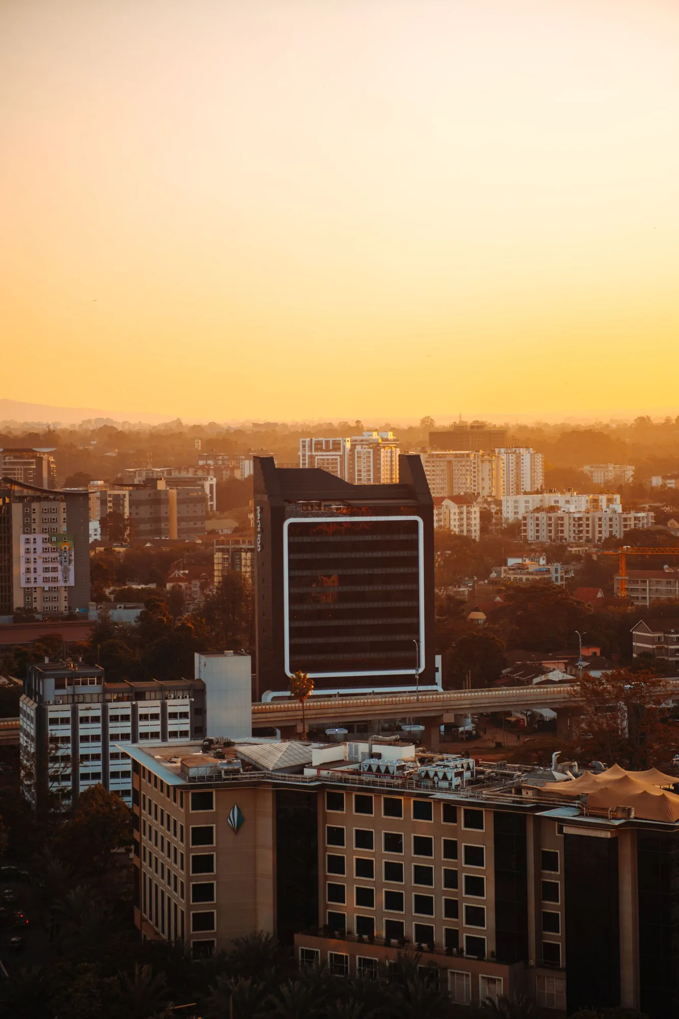 Nairobi skyline at sunset, viewed across the city